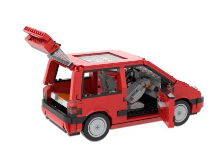 Renault Twingo 1992 MOC Lego - Puertas abiertas Coche rojo de juguete con puertas y maletero abiertos, estilo LEGO.
