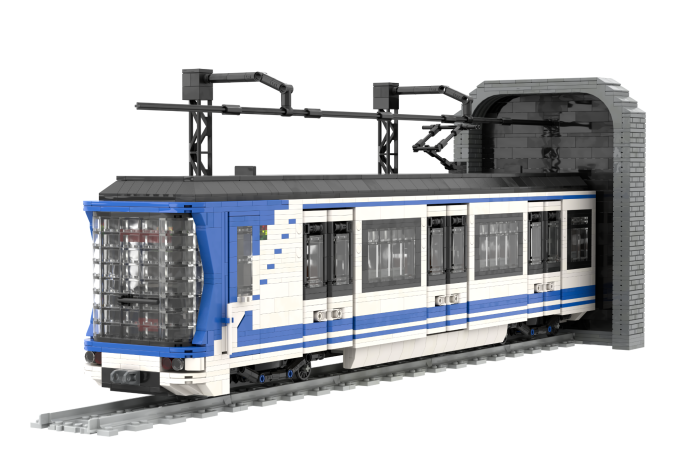 CAF serie 2000 (1 módulo) - I Tren eléctrico azul y blanco saliendo de un túnel.