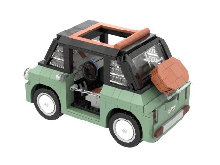 Fiat Topolino MOC Lego - Vista exterior Coche de juguete verde con techo abierto y maletero rojo.