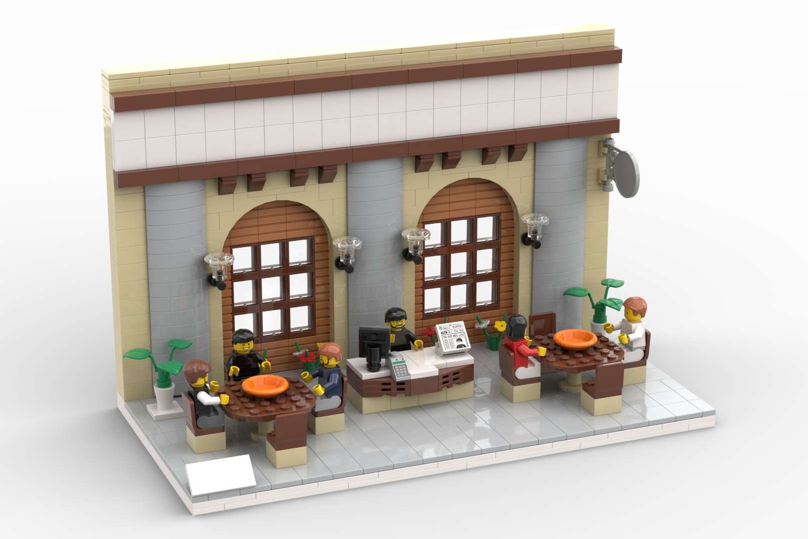 Restaurante MOC Lego Construcción de un restaurante con mesas, sillas y decoración colorida.