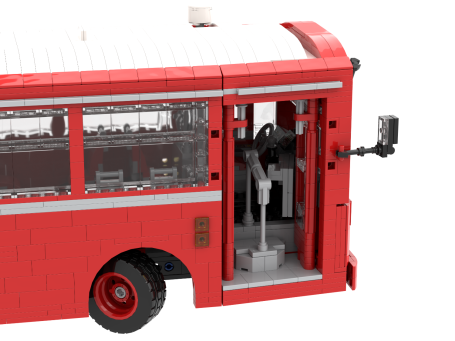 Autobús de juguete rojo con detalles en gris y ventanas transparentes.
