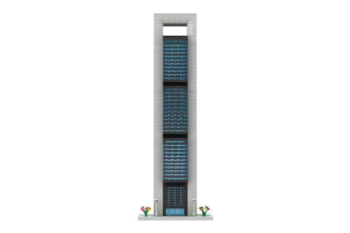 Edificio Fóster Cepsa Moeve - II Edificio moderno y alto con ventanas azules y plantas en la base.