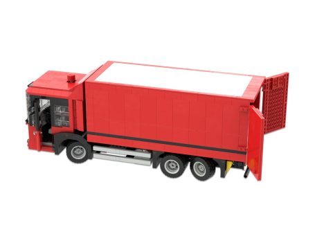 Mercedes Benz Econic MOC Lego - Puertas abiertas Camión de juguete rojo con caja contenedora y puertas traseras abiertas.