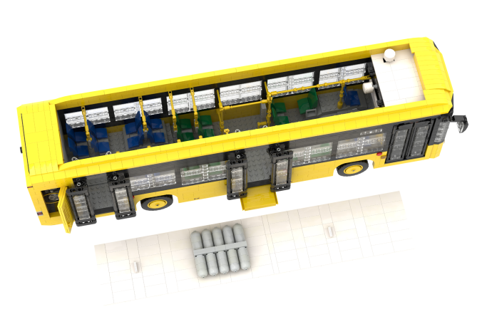 Castrosua Scania New City - III Autobús amarillo con asientos y ventanas, visto desde arriba.