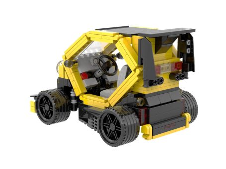 Renault Twizy Sport F1 MOC Lego - Parte trasera Coche de juguete construido con piezas de Lego, en colores amarillo y negro.