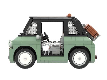 Fiat Topolino Dolce Vita MOC Lego - Vista lateral Coche de juguete de bloques, color verde, con parte del techo y detalles visibles.