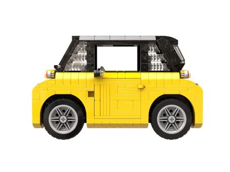 Citroën AMI MOC Lego - Vista lateral Coche de juguete LEGO amarillo con techo negro y ruedas grises.